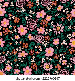 Seamless folk floral pattern. Small blossom daisies, wildflowers and plants in simple sketch flat manner. Cartoon Boho-chic style. Summer fashion print for design, fabric, textile, wrapping, web, card