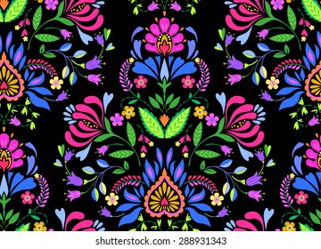 seamless folk pattern with Polish and Mexican influence. trendy ethnic decorative flowers in symmetric allover design. for fashion, interior, stationery, web.