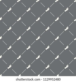 seamless footprint pattern on a dark background. footprint icon creative design. Can be used for wallpaper, web page background, textile, print UI/UX