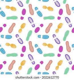 Seamless footprints. Color shoes prints, different soles traces, silhouette people steps, sneakers, boots and sneakers marks. Decor textile, wrapping paper, print or fabric. Vector pattern