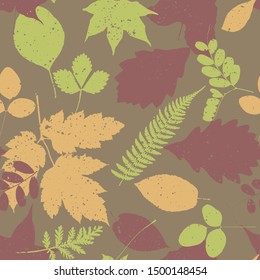 Seamless forest pattern with autumn leaves silhouettes. Fall background.