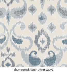 Seamless french blue farmhouse ikat paisley linen textured background.seamless ikat paisley pattern on biege and blue.