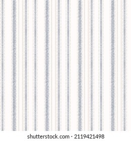 Seamless French country kitchen stripe fabric pattern print. Blue yellow white vertical striped background. Batik dye provence style rustic woven cottagecore textile. 