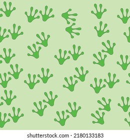 Seamless frog paw pattern in green