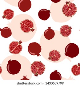 The seamless fruit pattern with ripe pomegranate. Vector.