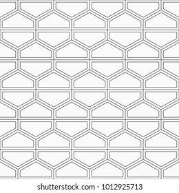 Seamless geometric abstract pattern of hexagons, divided into two parts. Fashion geometrical pattern. Linear style. For fashion textile, cloth, backgrounds. Vector background.