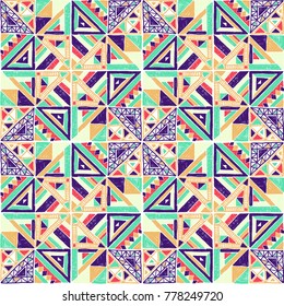 Seamless geometric African pattern. Ethnic ornament on the carpet. Aztec style. Tribal ethnic vector texture. Embroidery on fabric. Indian, Mexican, folk pattern. Quilting, patchwork, jacquard.