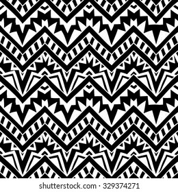 Seamless geometric background. Black and white vector illustration. Handmade. Ethnic ornament, tribal motifs.