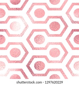 Seamless geometric background of rose foil with a grid of hexagonal elements