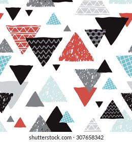 Seamless geometric coral blue black and white tribal triangle hand drawn pastel background pattern in vector