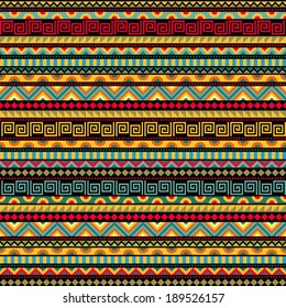 Seamless geometric ethnic pattern. Abstract African pattern in vivid colors. Fancy multicolored background ornament. Vector file is EPS8, all elements are grouped by colors.