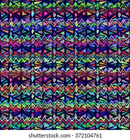 Seamless geometric ethnic pattern. Bright colored structure of the traditional folk forms. Vector painted hands.