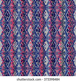 Seamless geometric ethnic pattern. Bright colored structure of the traditional folk forms. Vector painted hands.