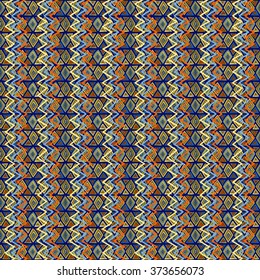 Seamless geometric ethnic pattern. Bright colored structure of the traditional folk forms. Vector painted hands.