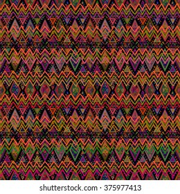 Seamless geometric ethnic pattern. Bright colored structure of the traditional folk forms. Vector painted hands.