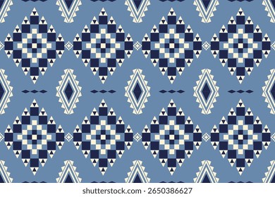 Seamless geometric ethnic pattern in soothing blue, cream, and dark blue tones. Features diamond and square tribal motifs, ideal for textiles, fashion, backgrounds, wallpaper, rug, cultural designs.