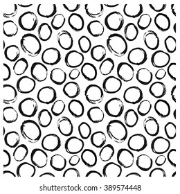 Seamless geometric graphics circle triangle hand drawn ink with brush background pattern in vector. Trendy hipster style. Monochrome pattern.