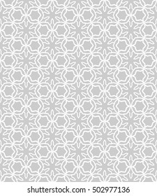 Seamless geometric line pattern in arabian style, ethnic ornament. Endless texture for wallpaper, banners, invitation cards. Gray and white graphic lace background