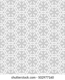 Seamless geometric line pattern in arabian style, ethnic ornament. Endless texture for wallpaper, banners, invitation cards. Gray and white graphic lace background