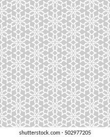 Seamless geometric line pattern in arabian style, ethnic ornament. Endless texture for wallpaper, banners, invitation cards. Gray and white graphic lace background