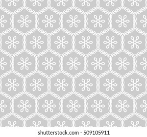 Seamless geometric line pattern in arabian style, ethnic ornament. Endless hexagonal texture for wallpaper, banners, invitation cards. Gray and white graphic lace background