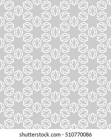 Seamless geometric line pattern in arabian style, ethnic ornament. Endless hexagonal texture for wallpaper, banners, invitation cards. Gray and white graphic lace background