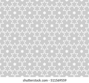Seamless geometric line pattern in arabian style, ethnic ornament. Endless hexagonal texture for wallpaper, banners, invitation cards. Gray and white graphic lace background