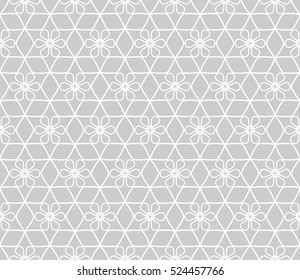Seamless geometric line pattern in arabian style, ethnic ornament. Endless hexagonal texture for wallpaper, banners, invitation cards. Gray and white graphic lace background