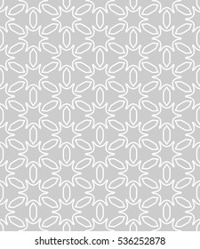 Seamless geometric line pattern in arabian style, ethnic ornament. Endless hexagonal texture for wallpaper, banners, invitation cards. Gray and white graphic lace background