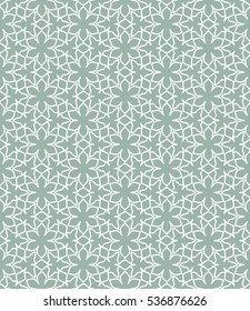 Seamless geometric line pattern in arabian style, ethnic ornament. Endless hexagonal texture for wallpaper, banners, invitation cards. Green and white graphic lace background