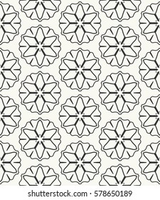Seamless geometric line pattern. Interlacing texture for wallpaper, banners, invitation cards, fabric print. Tribal ethnic linear seamless background in indian, islamic, arabic style. Black and white