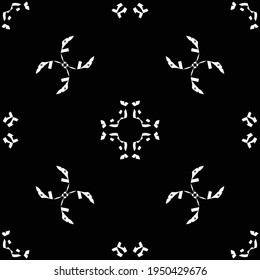 Seamless geometric mesh pattern. Black and white color.Wicker construction. White decor on a black background. For decoration, paper, wallpaper, fabric and free design. Multi-layer vector file.
