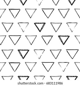 Seamless geometric ornament from handdrawn triangles. Can be used for fabrics and backgrounds