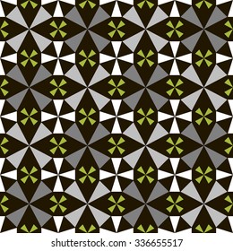 Seamless geometric pattern of abstract four petals flowers. Beautiful contrasting kaleidoscopic print in black, white, gray and green colors. Vector illustration for various creative projects