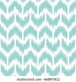 Seamless geometric pattern, based on ikat fabric style. Vector illustration.