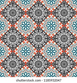 Seamless geometric pattern of black, white and gray tiles.