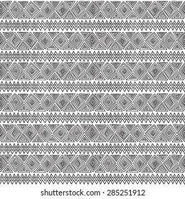 Seamless geometric pattern. Black and white graphics, diamonds, triangles and zigzags on a white background, ethnic, folk motives