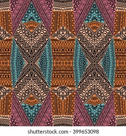 Seamless geometric pattern in the bohemian style. Abstract geometric background painted by hand. Tribal and ethnic motifs. Orange, blue, pink, beige and black. Vector illustration. Patchwork.