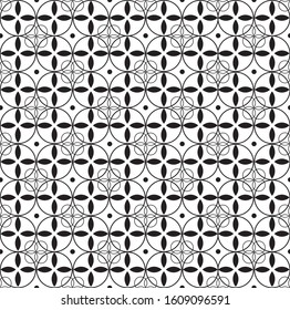 Seamless geometric pattern of circles and floral motifs. Clothing fabric print. Decorative black and white minimal pattern. Abstract print.