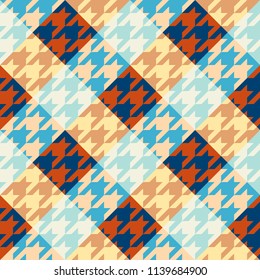 Seamless geometric pattern. Classic Hounds-tooth pattern in a patchwork plaid style. Vector image.