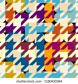 Seamless geometric pattern. Classic Hounds-tooth pattern in a patchwork collage style. Vector image.