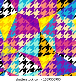 Seamless geometric pattern. Classic Hounds-tooth pattern in a collage style. Vector image.
