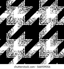 Seamless geometric pattern. Classic Hounds-tooth pattern in abstract style