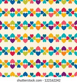 Seamless geometric pattern with colorful hearts. Can be used for wallpaper, pattern fills, web page background, surface textures.