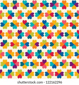 Seamless geometric pattern with colorful hearts. Can be used for wallpaper, pattern fills, web page background, surface textures.