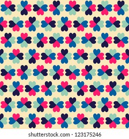 Seamless geometric pattern with colorful hearts. Can be used for wallpaper, pattern fills, web page background, surface textures.