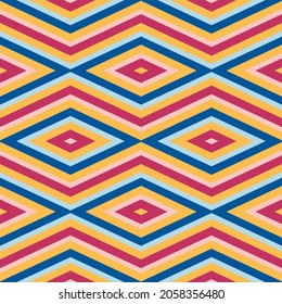 Seamless geometric pattern of  colorful rhombuses and zig zag lines. Vector illustration for web, card, scrapbooking, print block. Spring and summer colors, yellow, pink, blue, pastel shades. EPS 10.