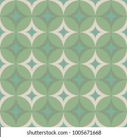 seamless geometric pattern in different shades of green against a cream colored background