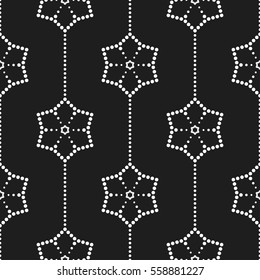 Seamless geometric pattern of dotted mosaic flowers in garlands. Abstract black and white background. Vector Illustration.