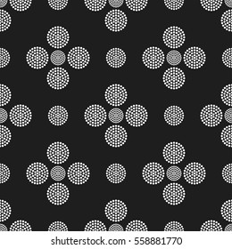 Seamless geometric pattern of dotted mosaic circles. Abstract black and white background. Vector Illustration.